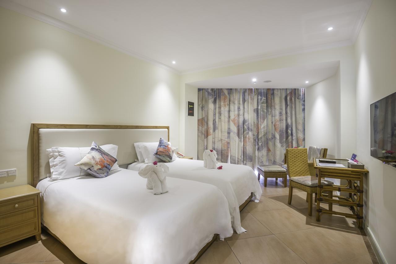 Sanya Resort Golden Palm Bagian luar foto