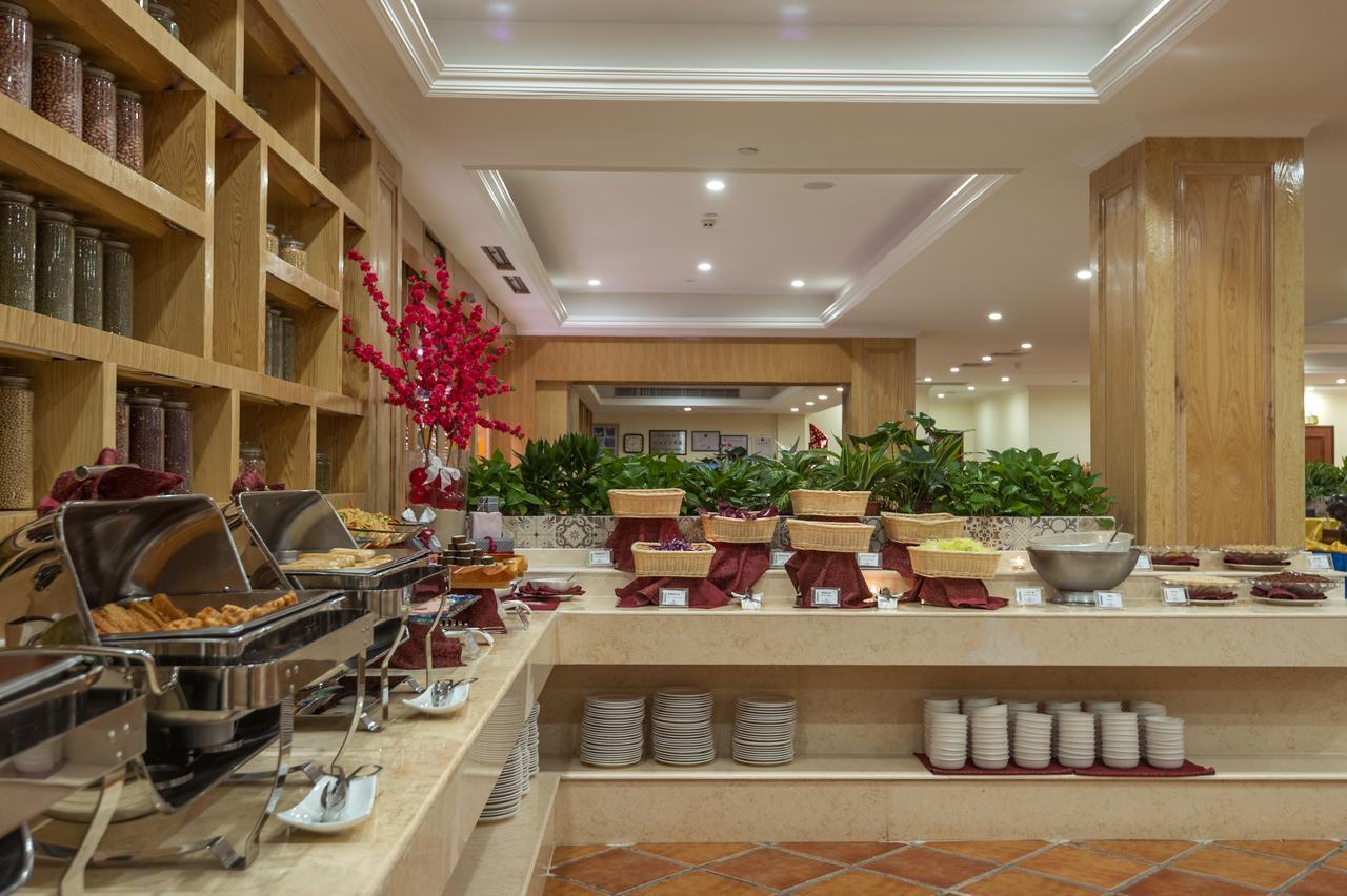 Sanya Resort Golden Palm Bagian luar foto